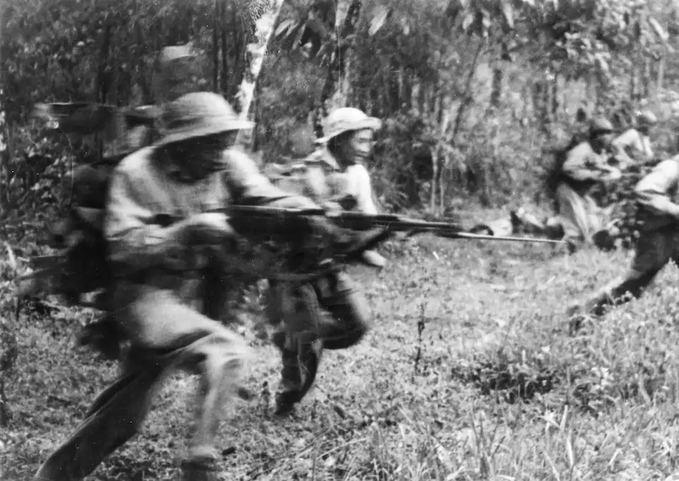 Vietnamese soldiers in a gunfight Vietnamese soldiers in a gunfight