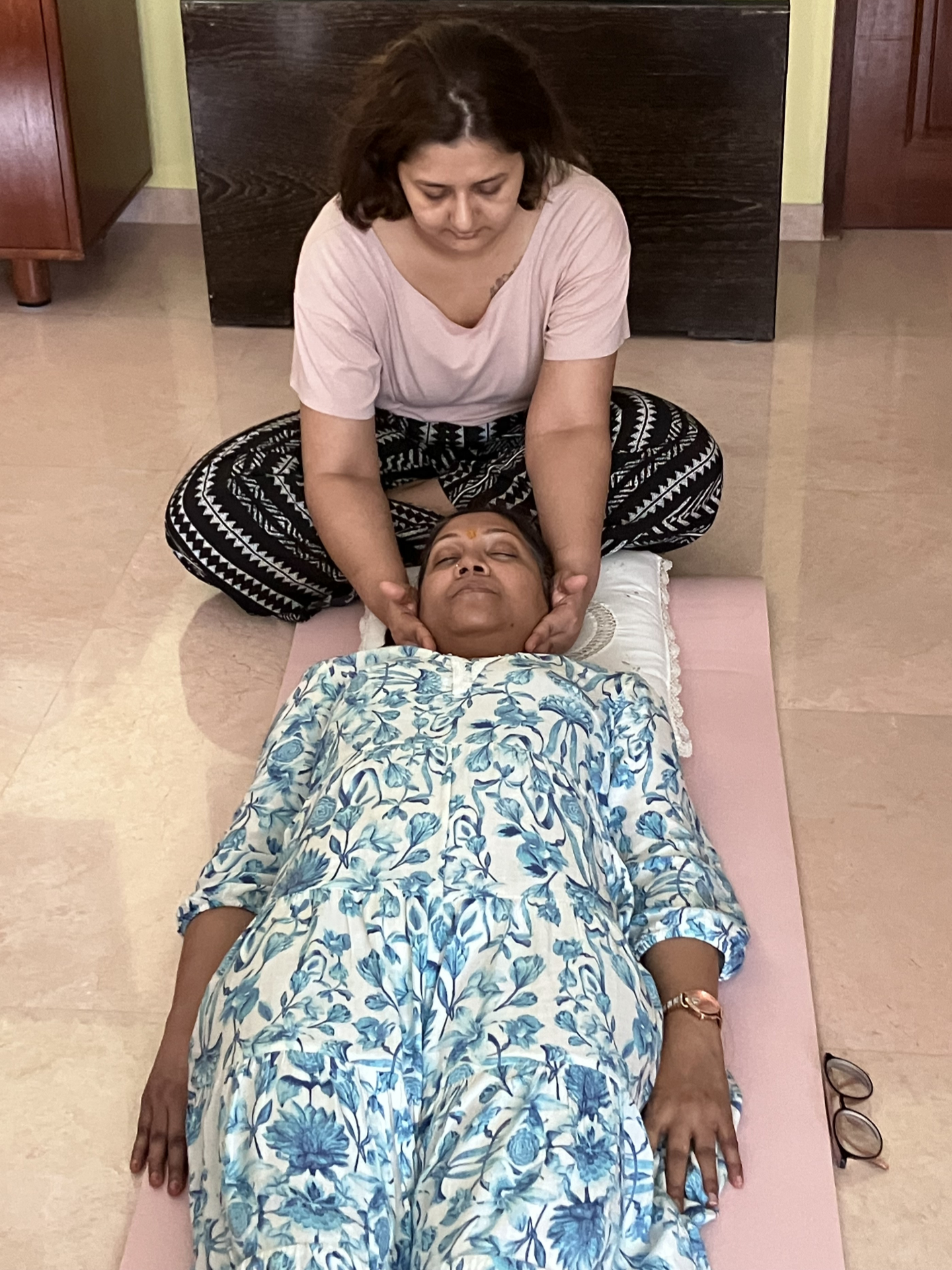 Students of Reiki 1 workshop on 25 May 2025 doing reiki healing on each other