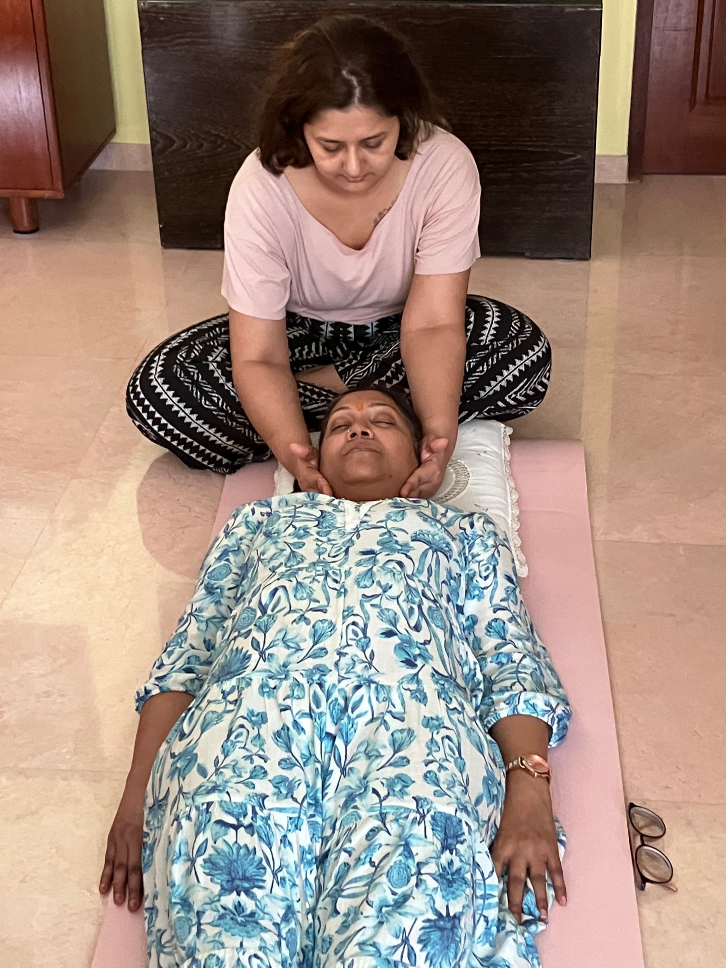 Students of Reiki 1 workshop on 25 May 2025 doing reiki healing on each other