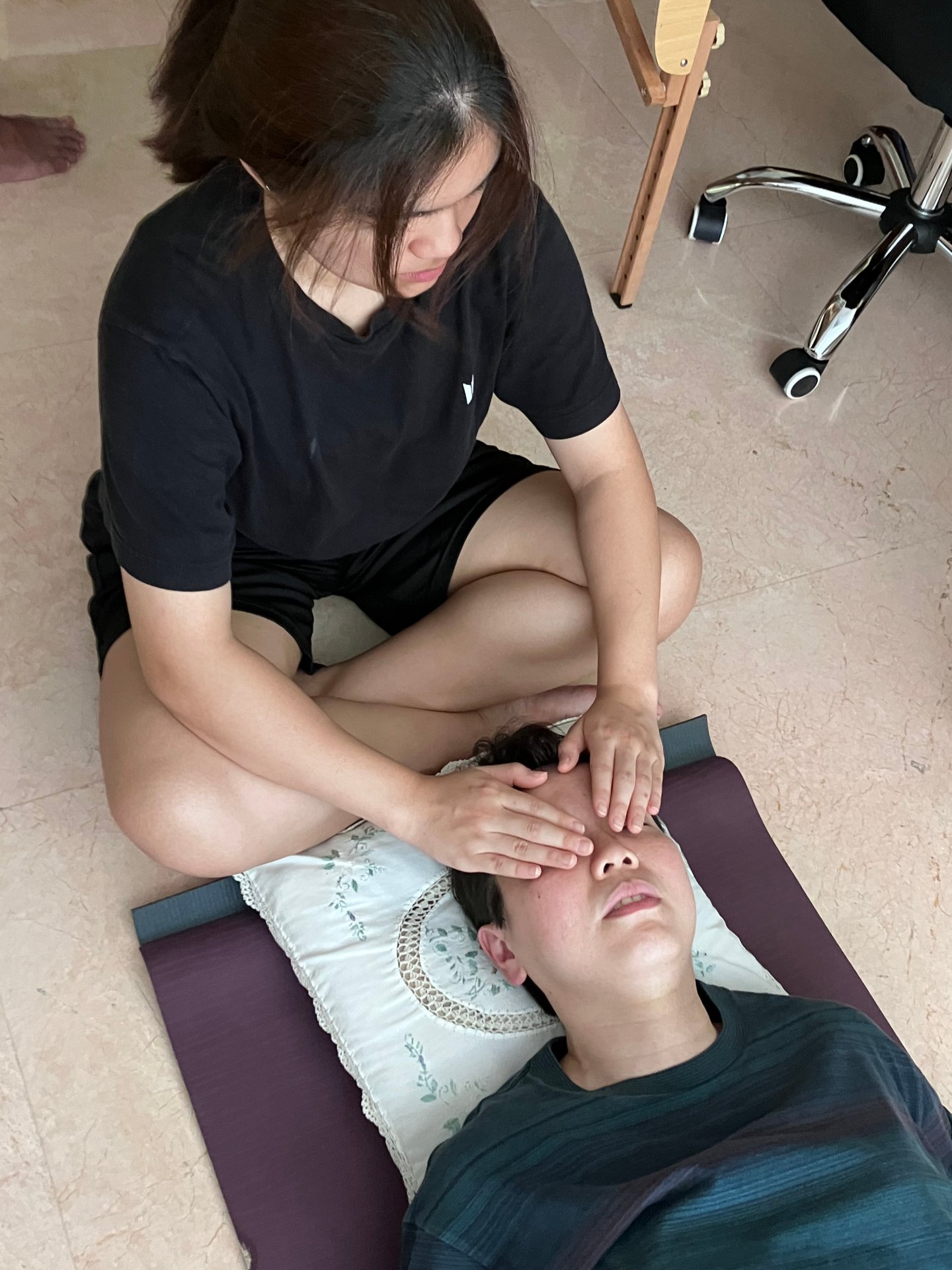 Students of Reiki 1 workshop on 25 May 2025 doing reiki healing on each other