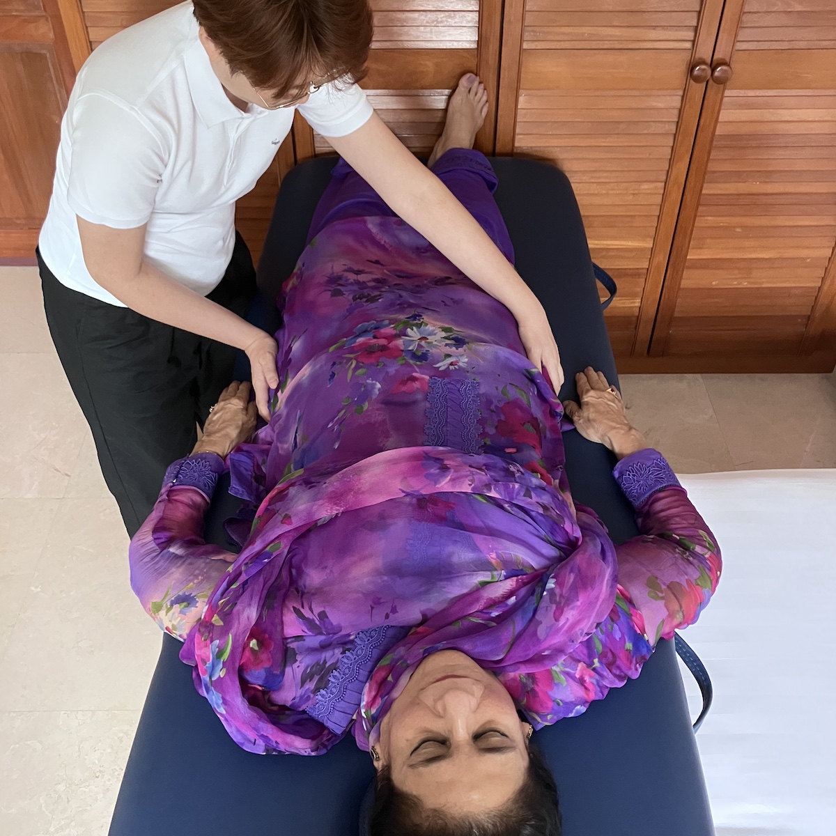 Student performing 12 hand positions reiki at the Reiki 1 workshop on 23 Aug 2025