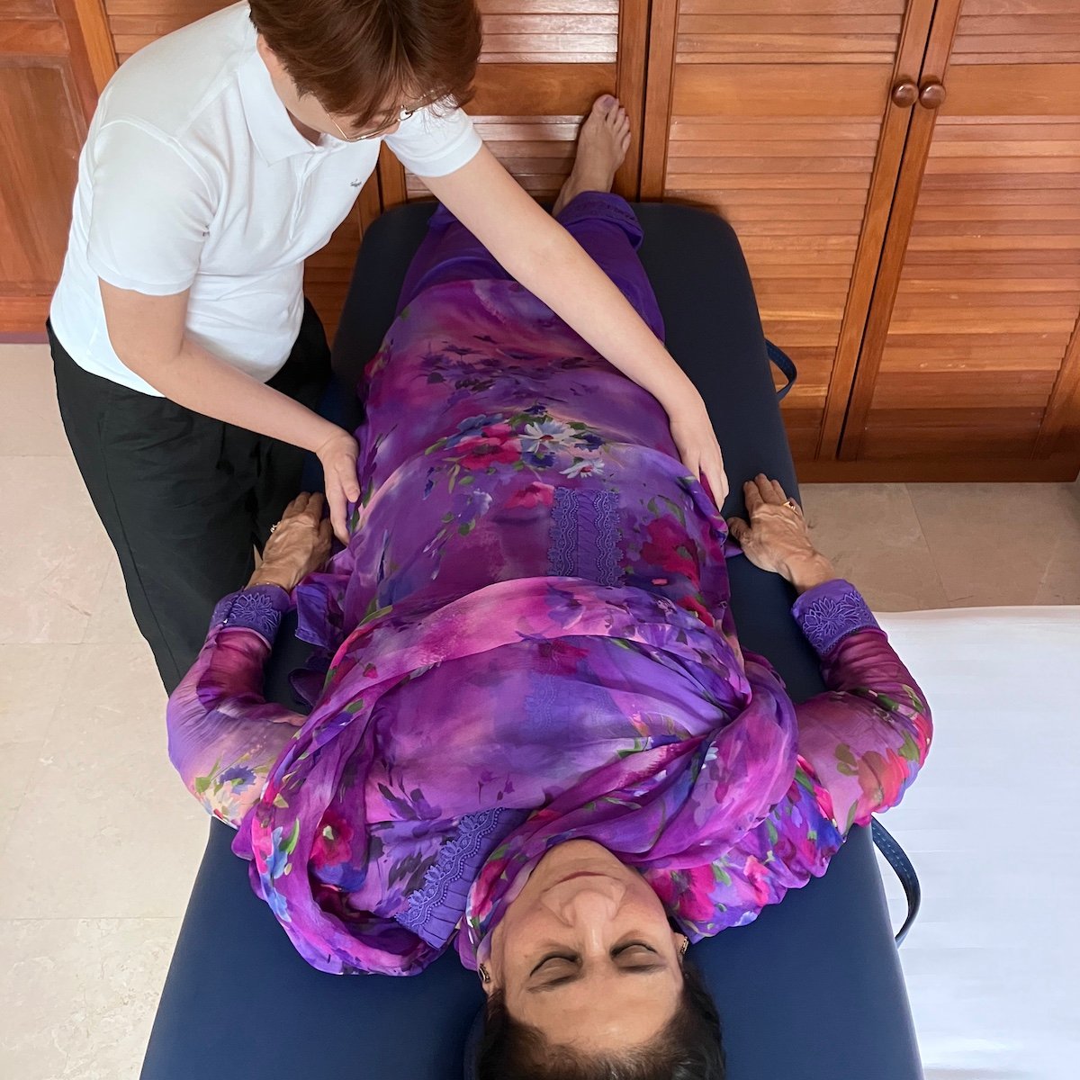 Student performing 12 hand positions reiki at the Reiki 1 workshop on 23 Aug 2025