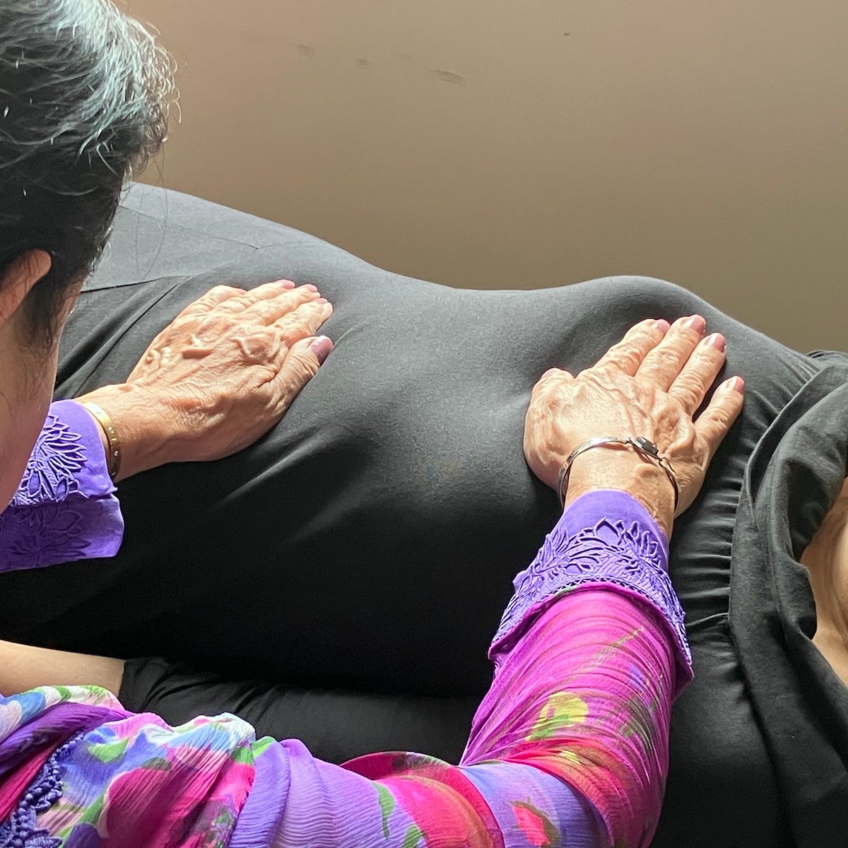Student performing intuitive reiki at the Reiki 1 workshop on 23 Aug 2025