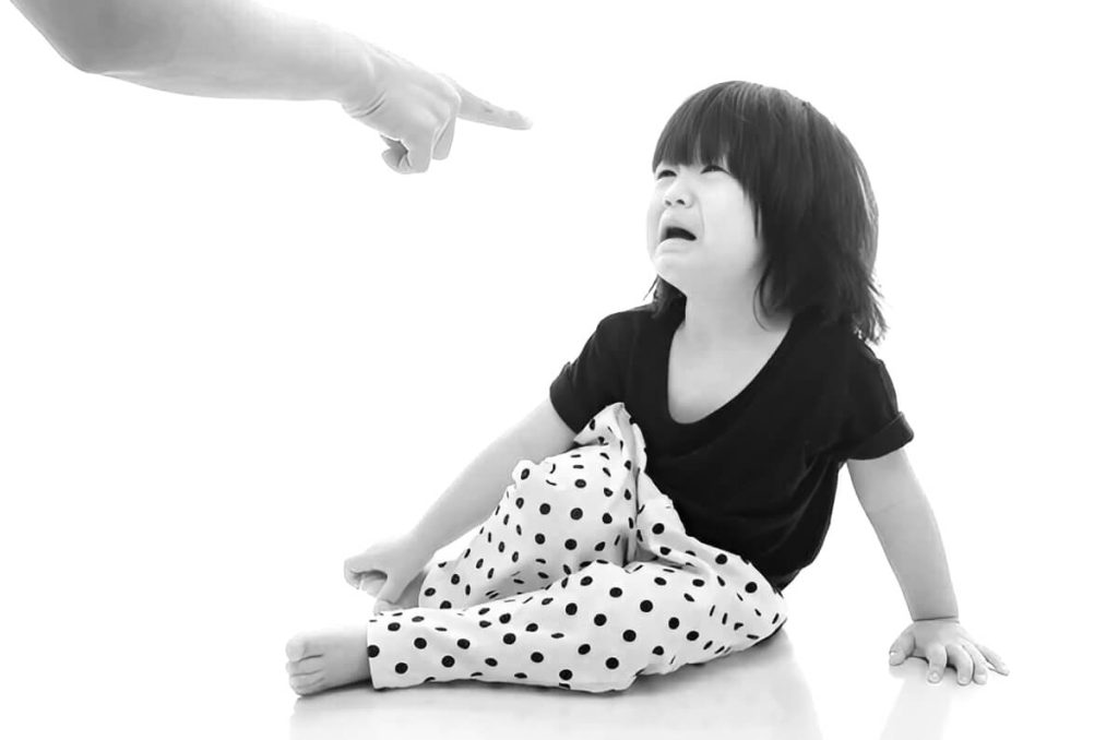 The mother scolds her child