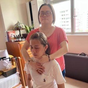 Students of Reiki 2 workshop on 27 Sep 2025 practicing reiki on each other